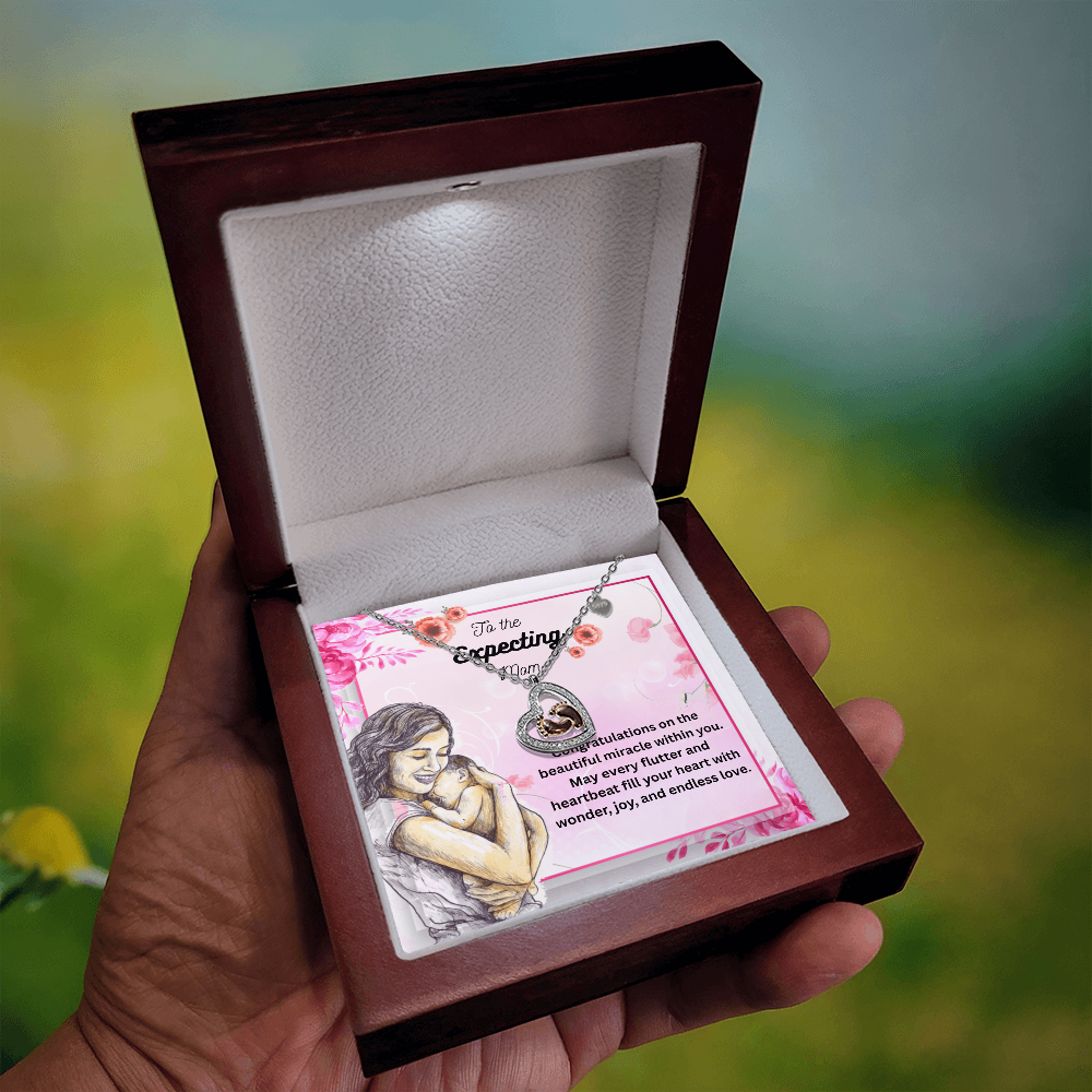Blossoms of Tomorrow: A Tribute to the Expecting Mom-Baby Feet Heart Necklace